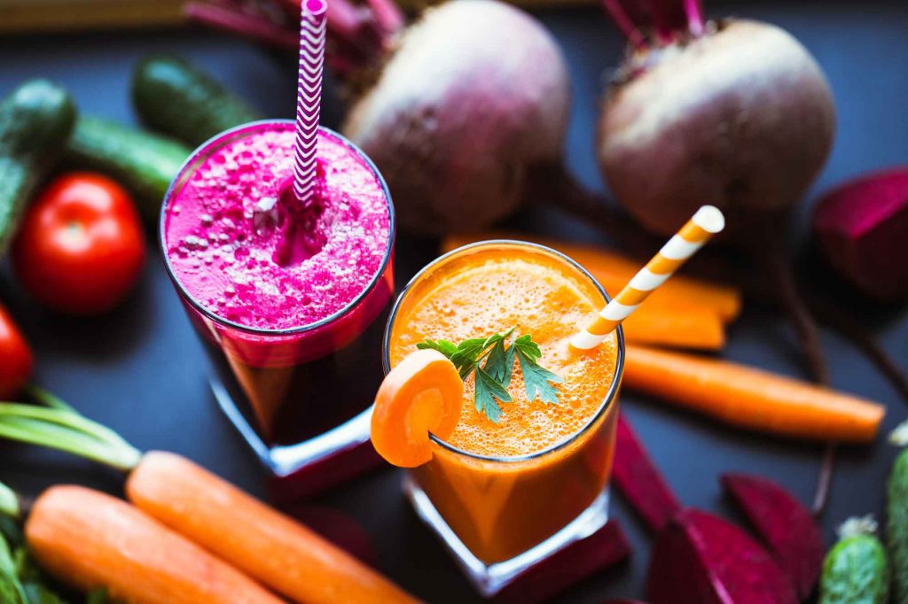 Two glasses of beet and carrot juice